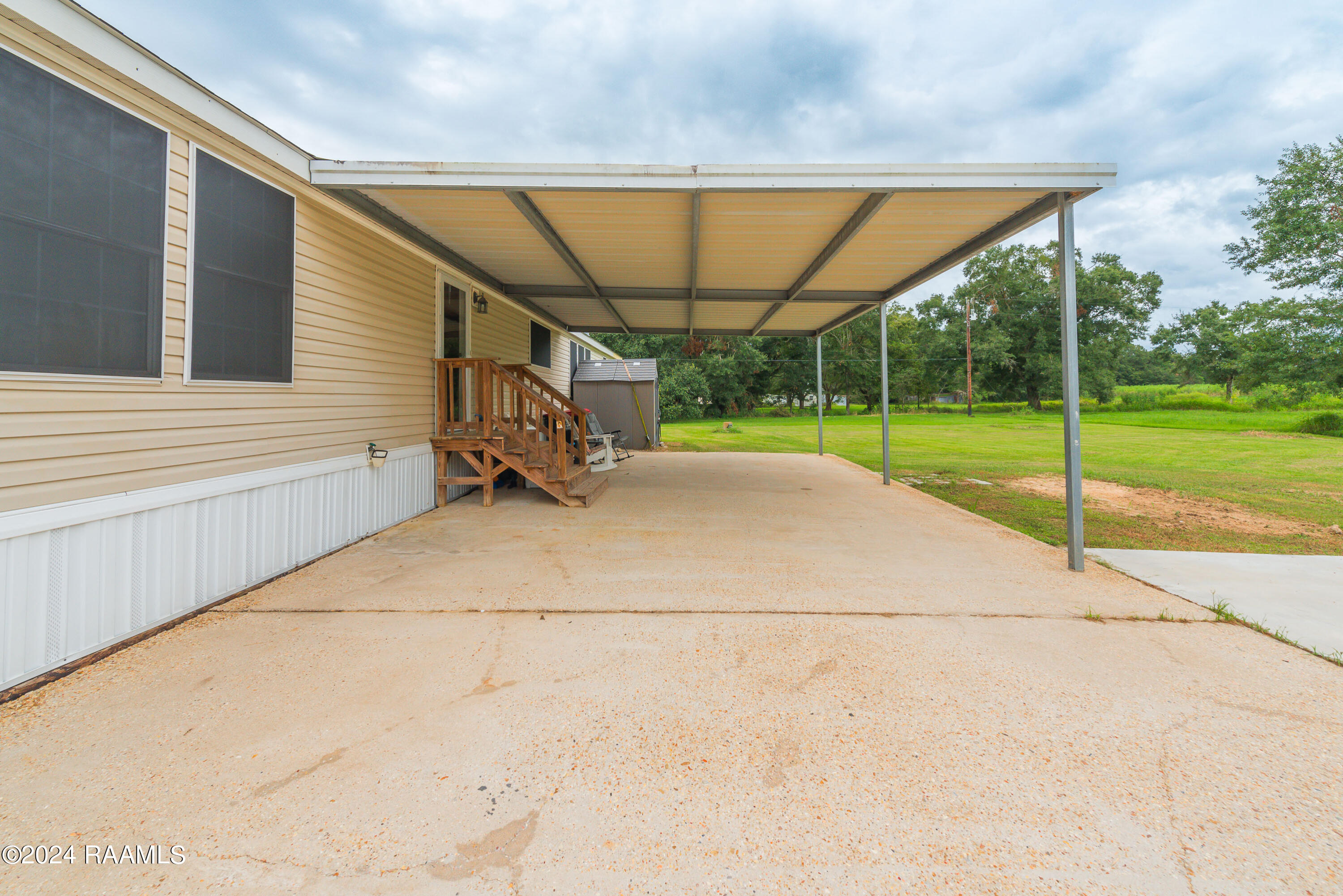 1715 Savoy Road Youngsville, LA 70592 - Photo 33 of 37 Back Patio