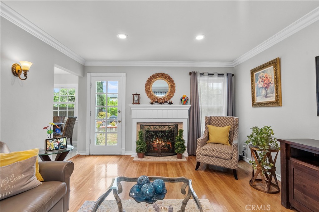 1902 North Screenland Drive Burbank, CA 91505 - Photo 6 of 25 a living room with furniture and a fireplace