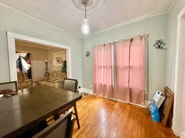 a living room with a toilet and a sink