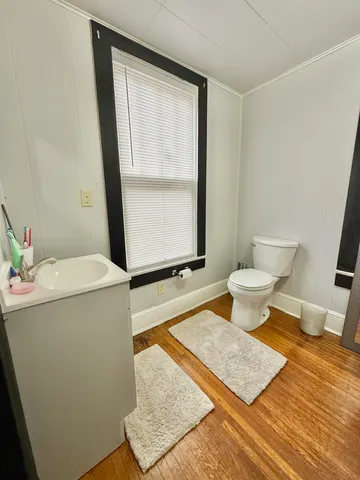 a kitchen with stainless steel appliances a stove a refrigerator and cabinets
