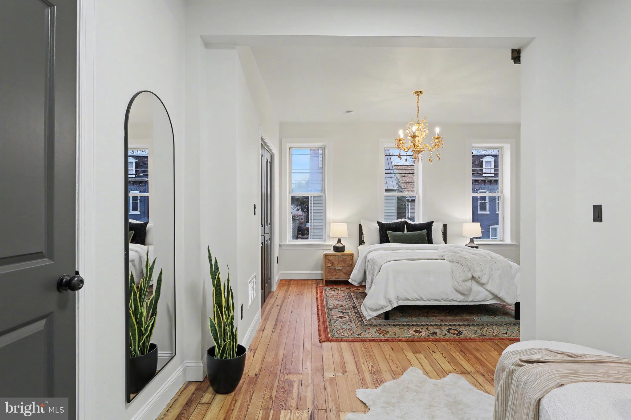 328 Walnut Street Columbia, PA 17512 - Photo 21 of 28 a living room with furniture and a potted plant