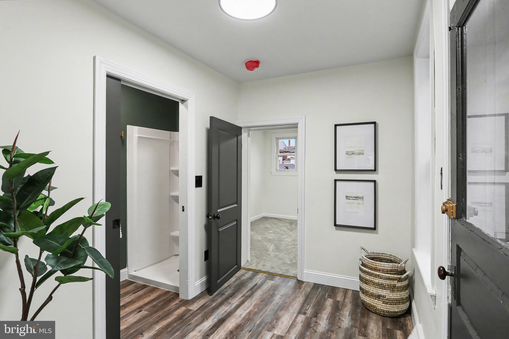328 Walnut Street Columbia, PA 17512 - Photo 23 of 28 a view of livingroom with furniture and a potted plant
