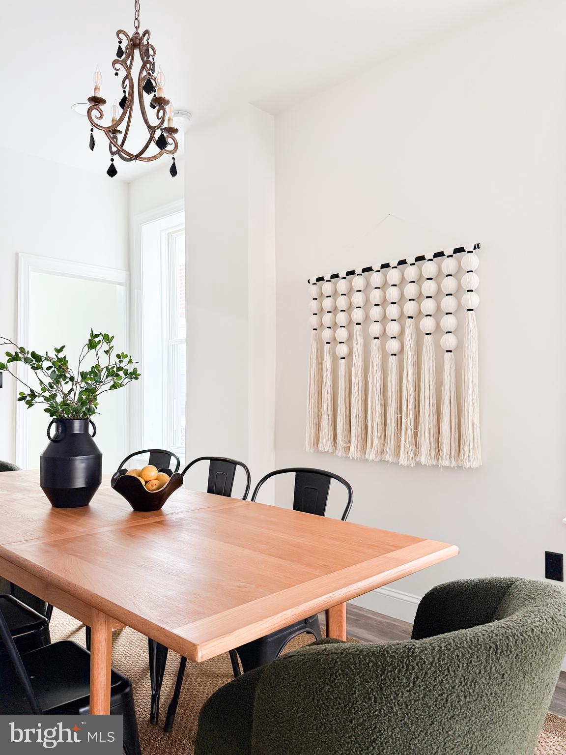 328 Walnut Street Columbia, PA 17512 - Photo 7 of 28 a table with a vase and flowers on it