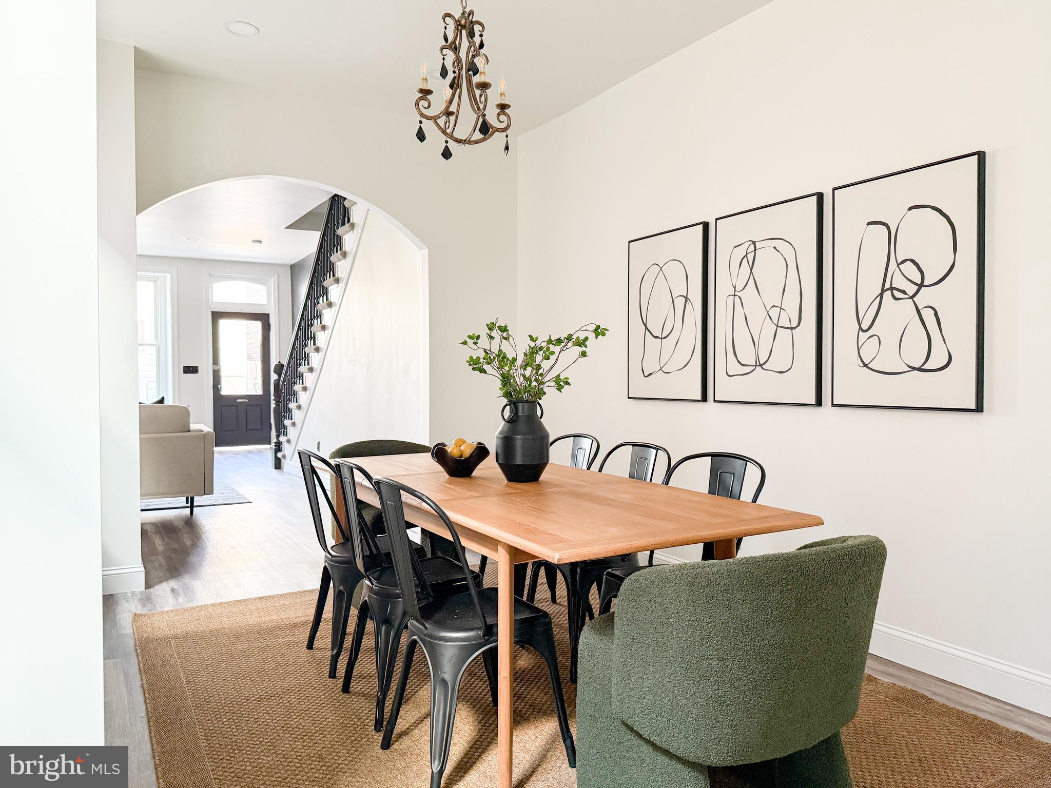 328 Walnut Street Columbia, PA 17512 - Photo 8 of 28 a view of a dining room with furniture and wooden floor