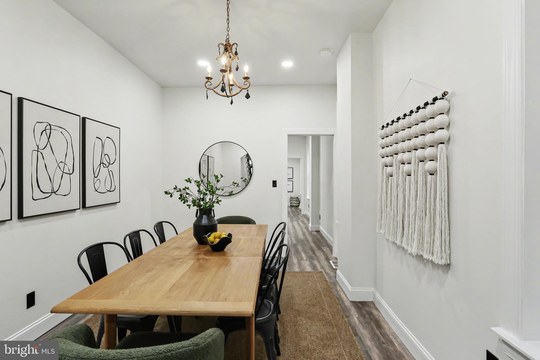328 Walnut Street Columbia, PA 17512 - Photo 10 of 28 a view of a dining room with furniture and wooden floor