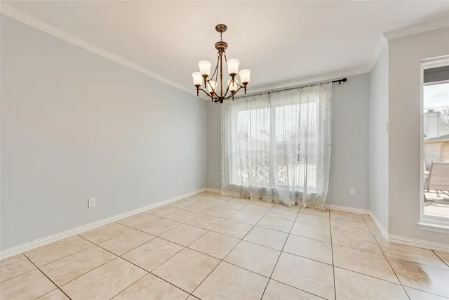 a spacious bathroom with a double vanity sink and a mirror