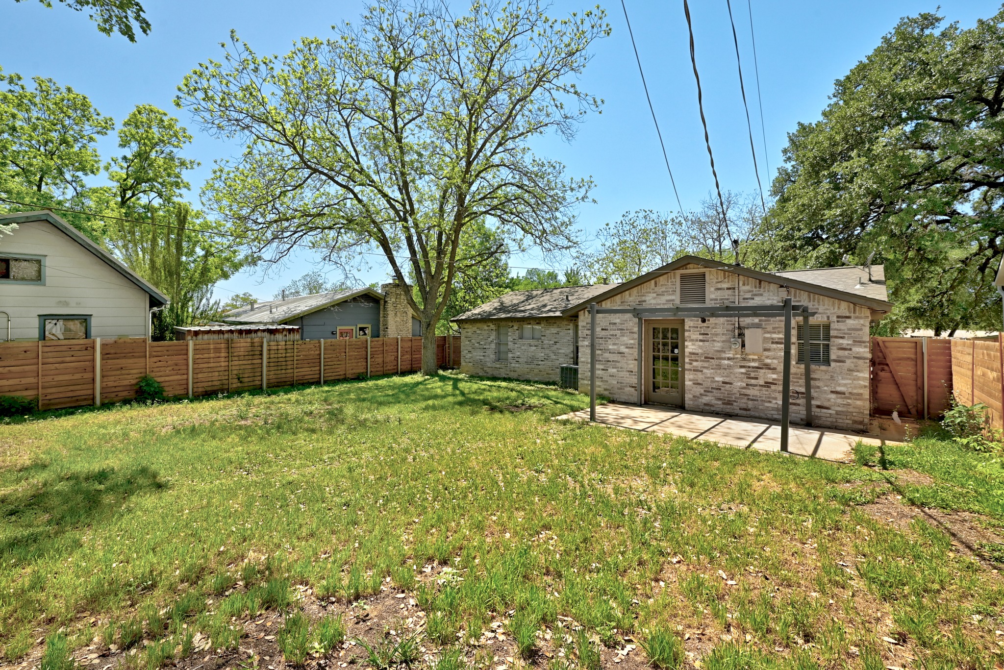 4619 Banister Lane Austin, TX 78745 - Photo 28 of 34 Fenced backyard featuring a patio area