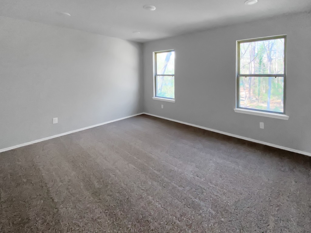 1202 St Lawrence River Road Montgomery, TX 77316 - Photo 17 of 21 an empty room with windows