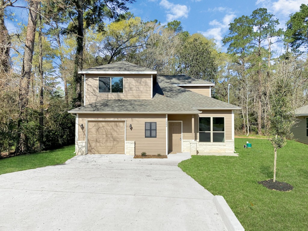 1202 St Lawrence River Road Montgomery, TX 77316 - Photo 4 of 21 front view of a house with a yard