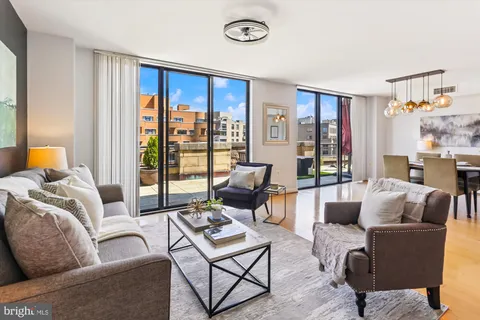 a bedroom with a bed and a table in it