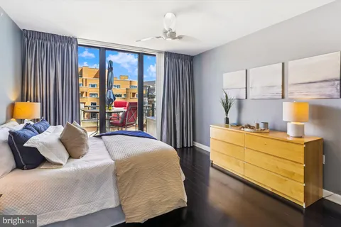 a spacious bathroom with a double vanity sink and a mirror