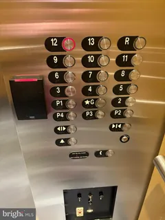 a outdoor space with lots of fruit on the table and chairs