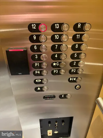 a outdoor space with lots of fruit on the table and chairs