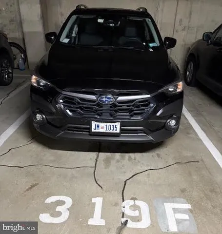 a view of a terrace with couches and sky view