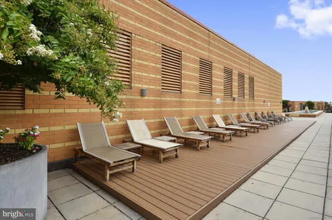 a view of a kitchen with dining space and wooden floor