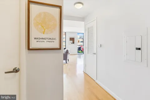 a view of a living room with furniture and a window