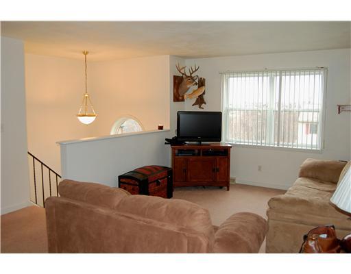156 Barrington Ridge Delmont, PA 15626 - Photo 2 of 15 Living Room. Neutral decor flows throughout.