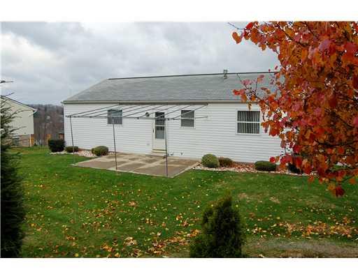 156 Barrington Ridge Delmont, PA 15626 - Photo 13 of 15 Patio/Deck. There is a nice rear patio with an awning.
