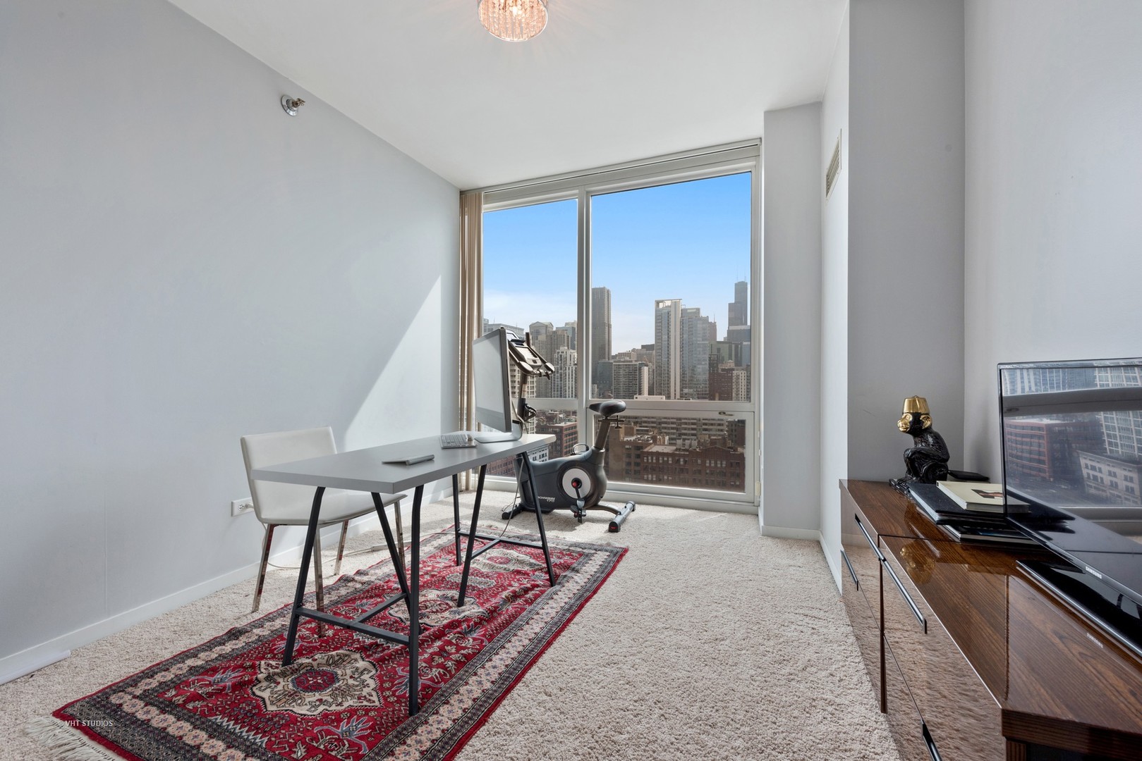 757 North Orleans Street, Unit 1812 Chicago, IL 60654 - Photo 10 of 17 a dining room with furniture and a floor to ceiling window