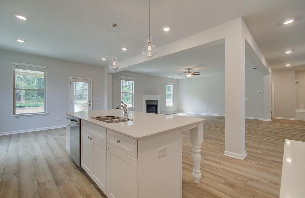 624 Sidney Court Stockbridge, GA 30281 - Photo 11 of 29 a kitchen with a sink and wooden floor