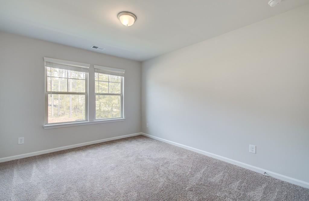 624 Sidney Court Stockbridge, GA 30281 - Photo 18 of 29 an empty room with a window