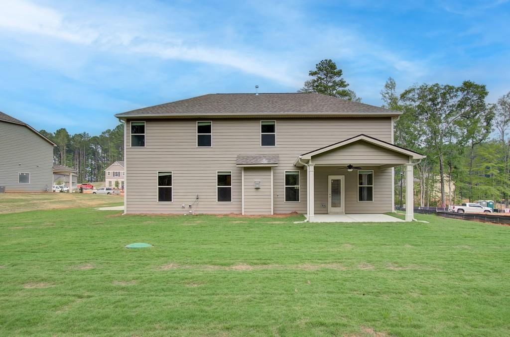 624 Sidney Court Stockbridge, GA 30281 - Photo 29 of 29 a front view of a house with a yard
