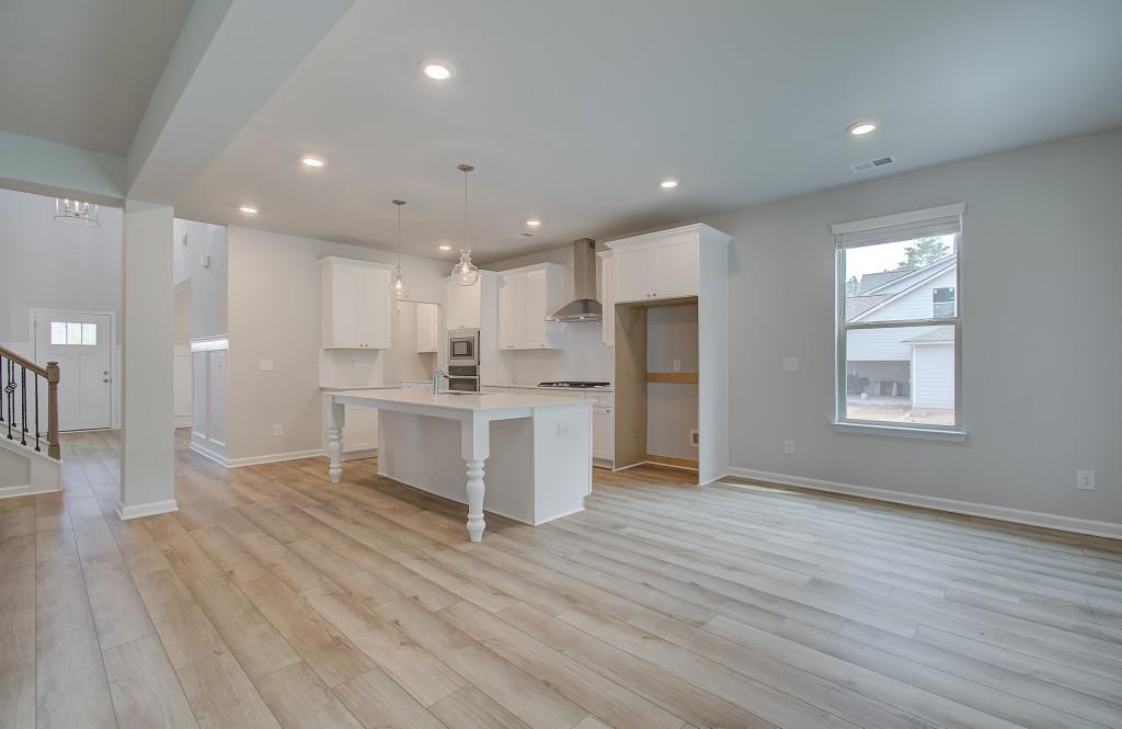 624 Sidney Court Stockbridge, GA 30281 - Photo 7 of 29 a view of kitchen with wooden floor