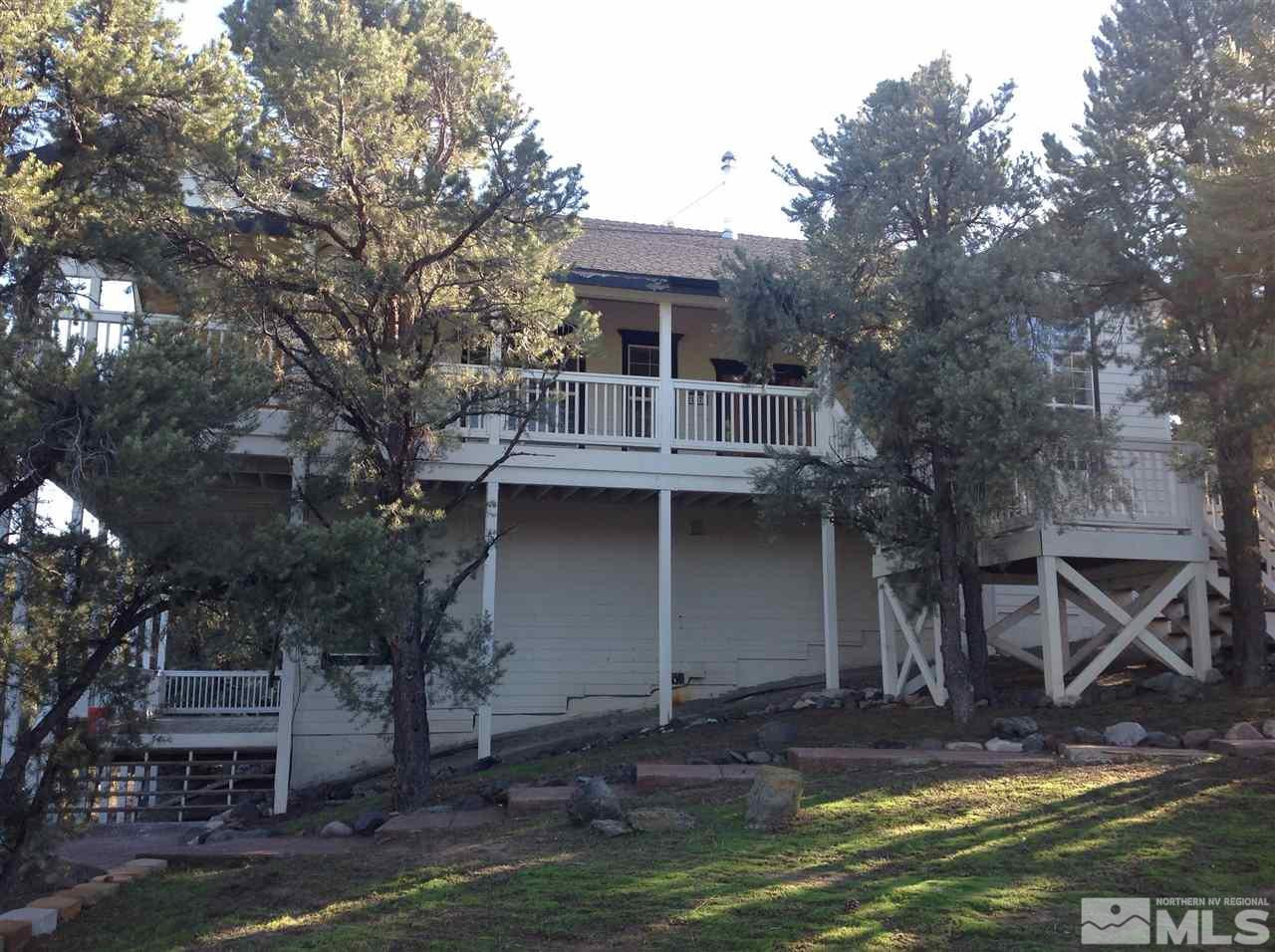 21575 Sazarac Road Reno, NV 89521 - Photo 1 of 1 a view of front of house with a yard