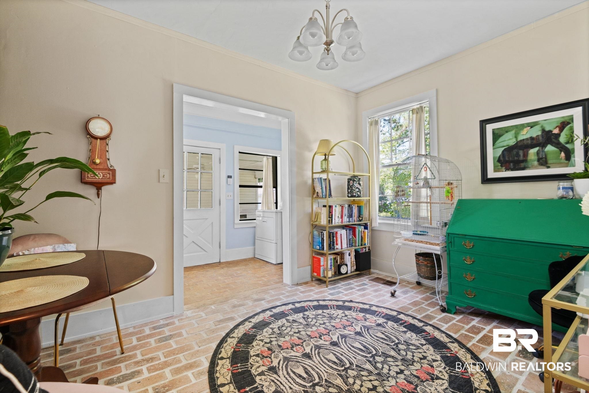 324 4th Street Mobile, AL 36611 - Photo 19 of 28 Rec room with ornamental molding and an inviting chandelier
