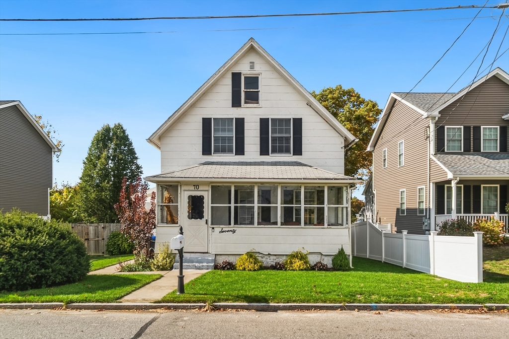 70 Nagle Street Springfield, MA 01151 - Photo 1 of 23 a front view of a house with a yard