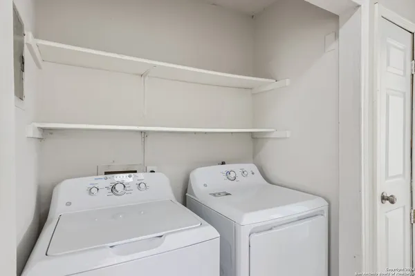 a view of utility room with washer and dryer