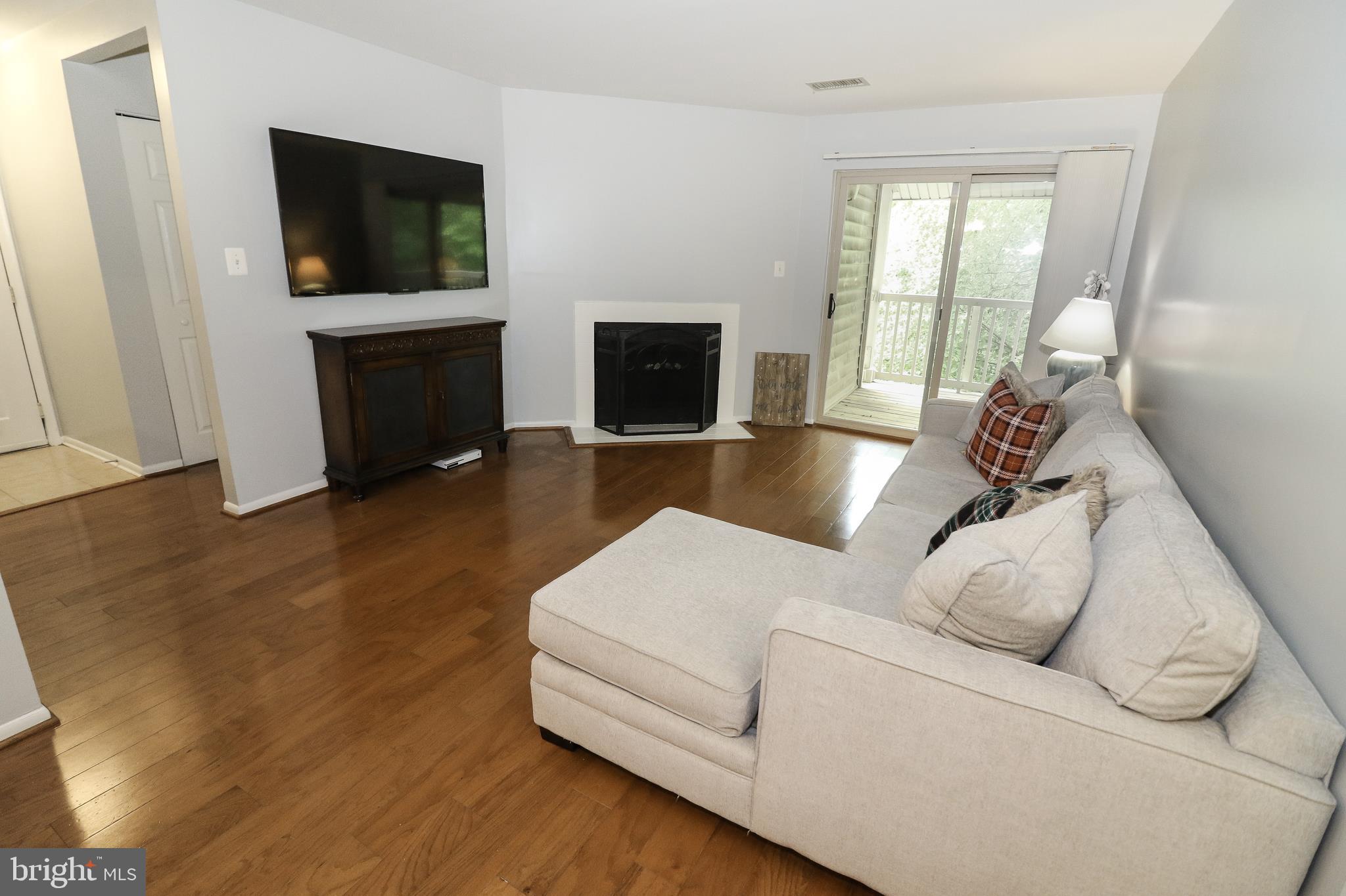 1705 Ascot Way, Unit E Reston, VA 20190 - Photo 6 of 40 Living Room