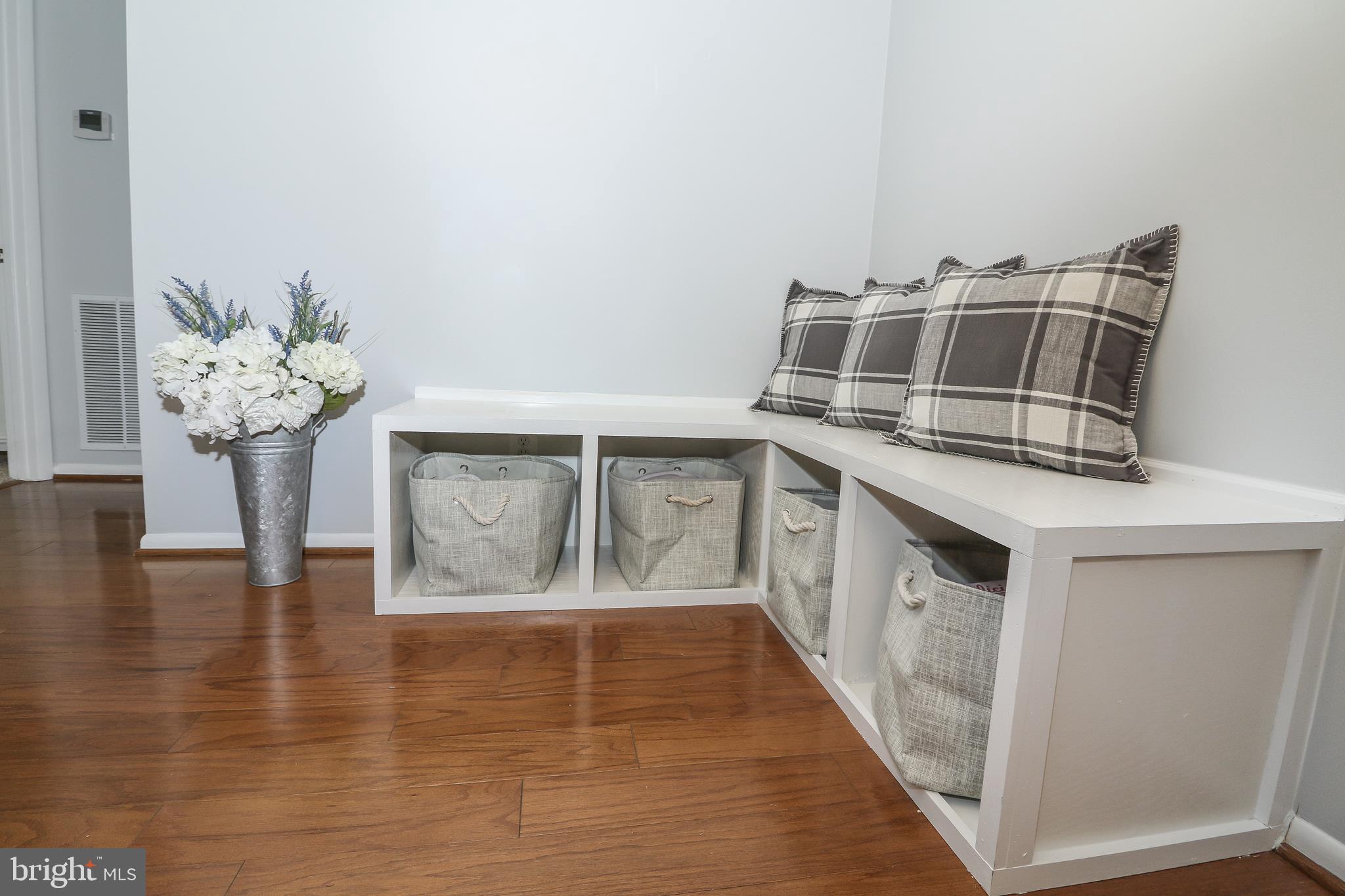 1705 Ascot Way, Unit E Reston, VA 20190 - Photo 10 of 40 Custom Built-In-Storage Dining Benches