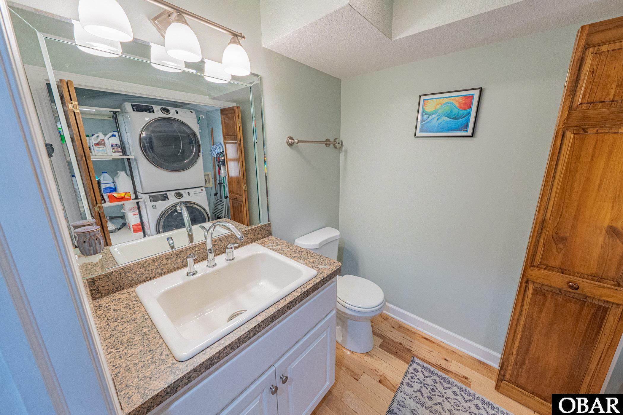 140 Fearing Place, Unit 63 Manteo, NC 27954 - Photo 22 of 50 Powder Bath and Laundry