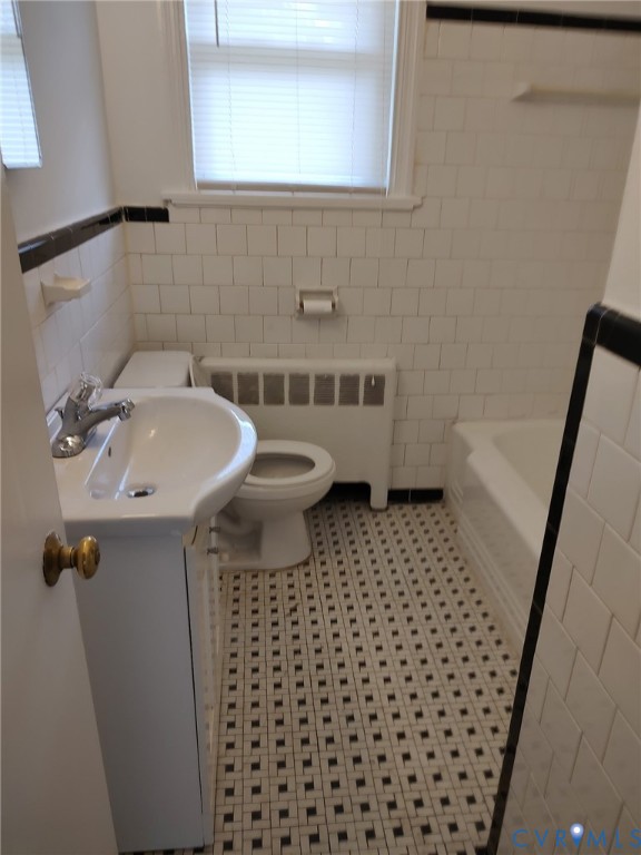 5310 Raleigh Road Henrico, VA 23231 - Photo 11 of 15 a bathroom with a sink and a mirror