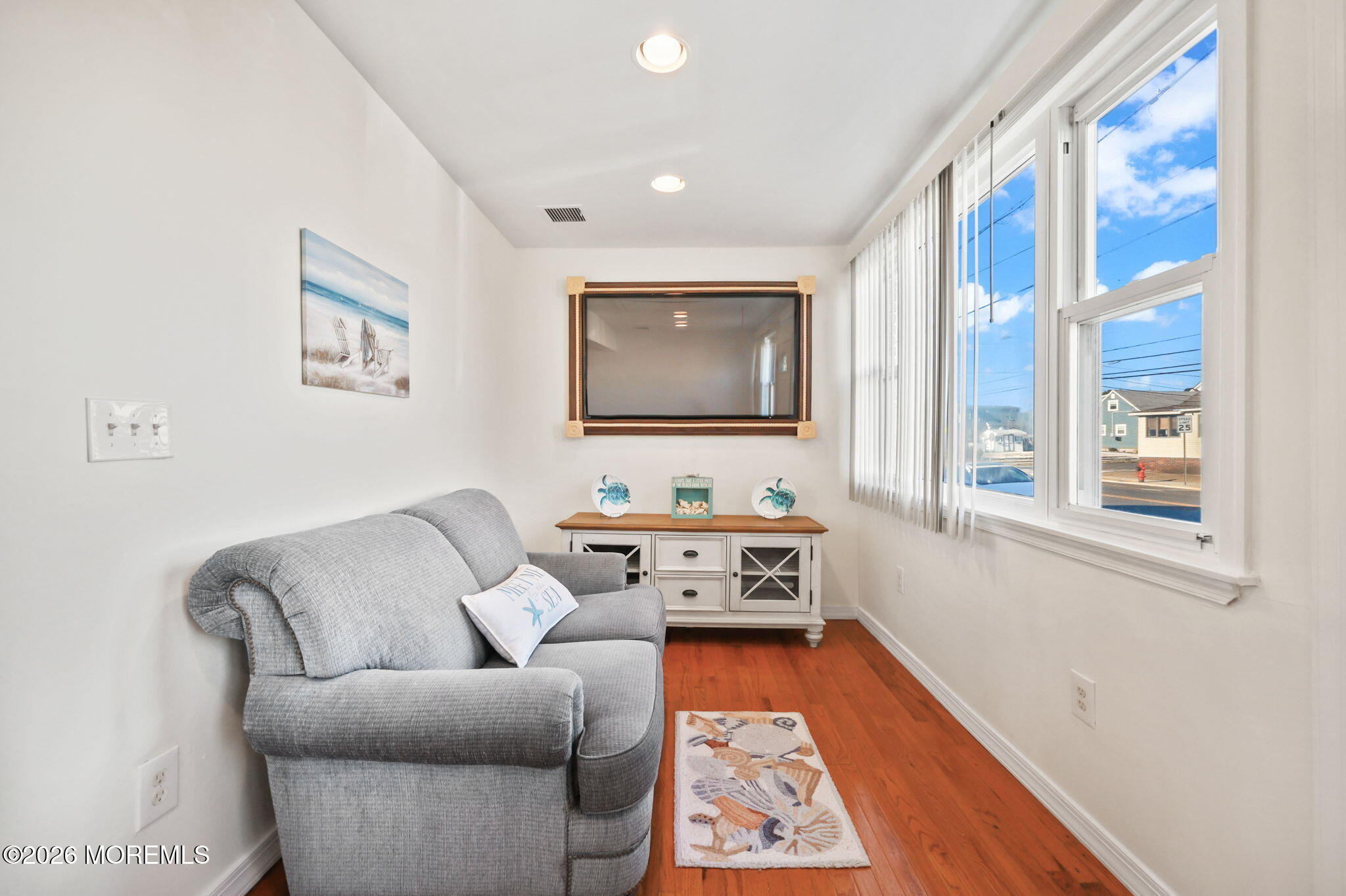 211 Ocean Avenue Point Pleasant Beach, NJ 08742 - Photo 13 of 60 a living room with furniture and a window