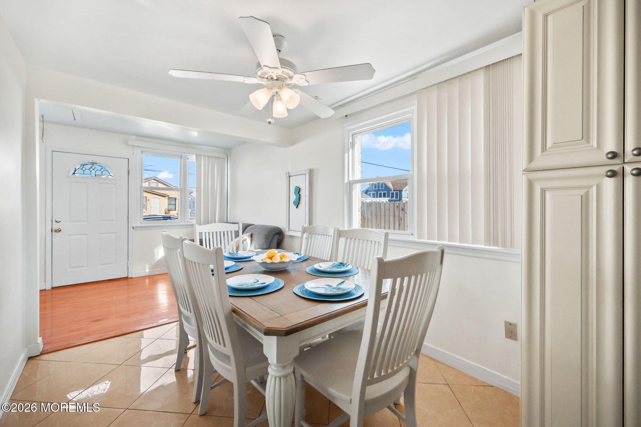 211 Ocean Avenue Point Pleasant Beach, NJ 08742 - Photo 16 of 60 a view of a dining room with furniture window and wooden floor