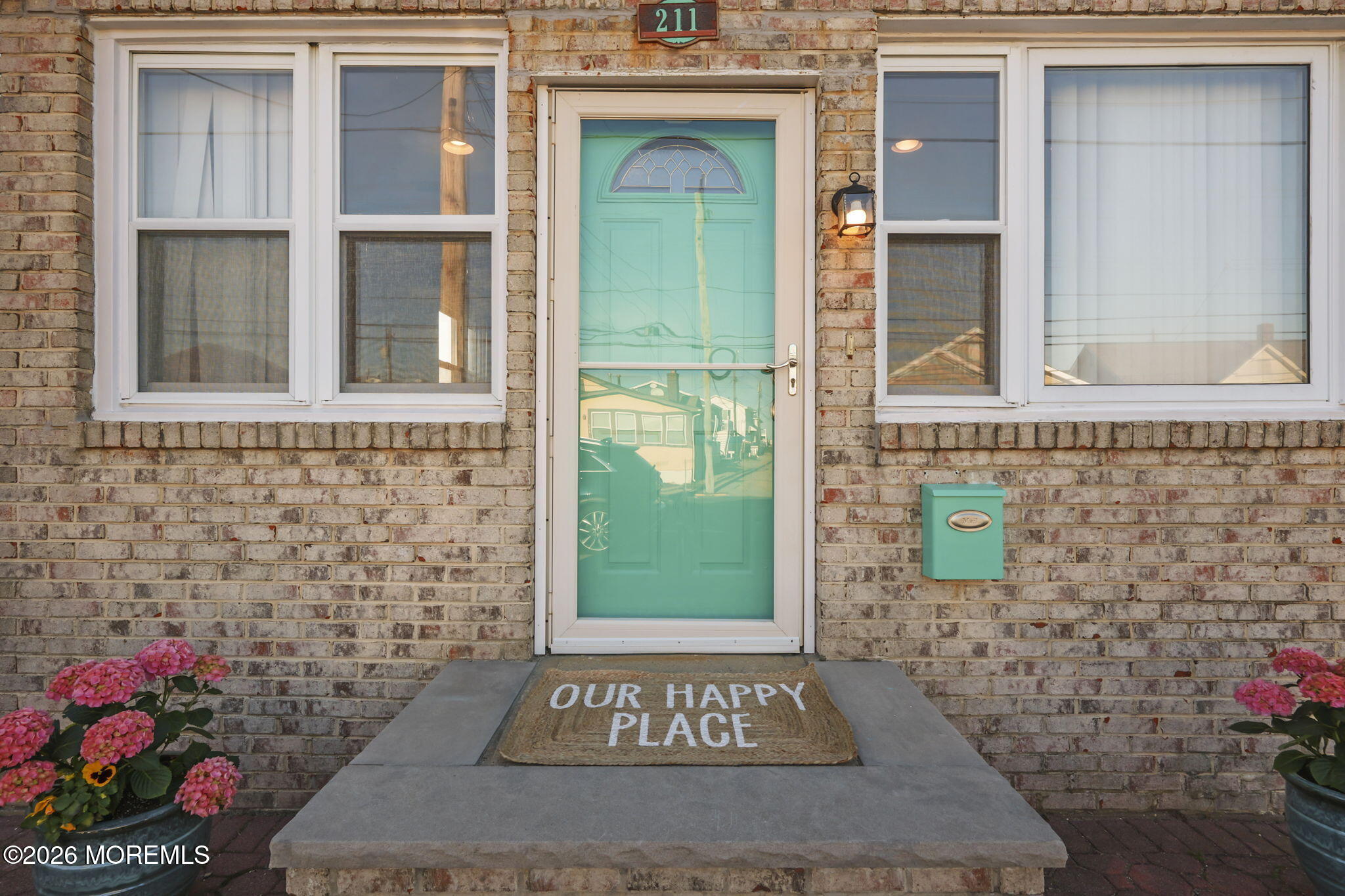 211 Ocean Avenue Point Pleasant Beach, NJ 08742 - Photo 2 of 60 a view of a entryway door of the house