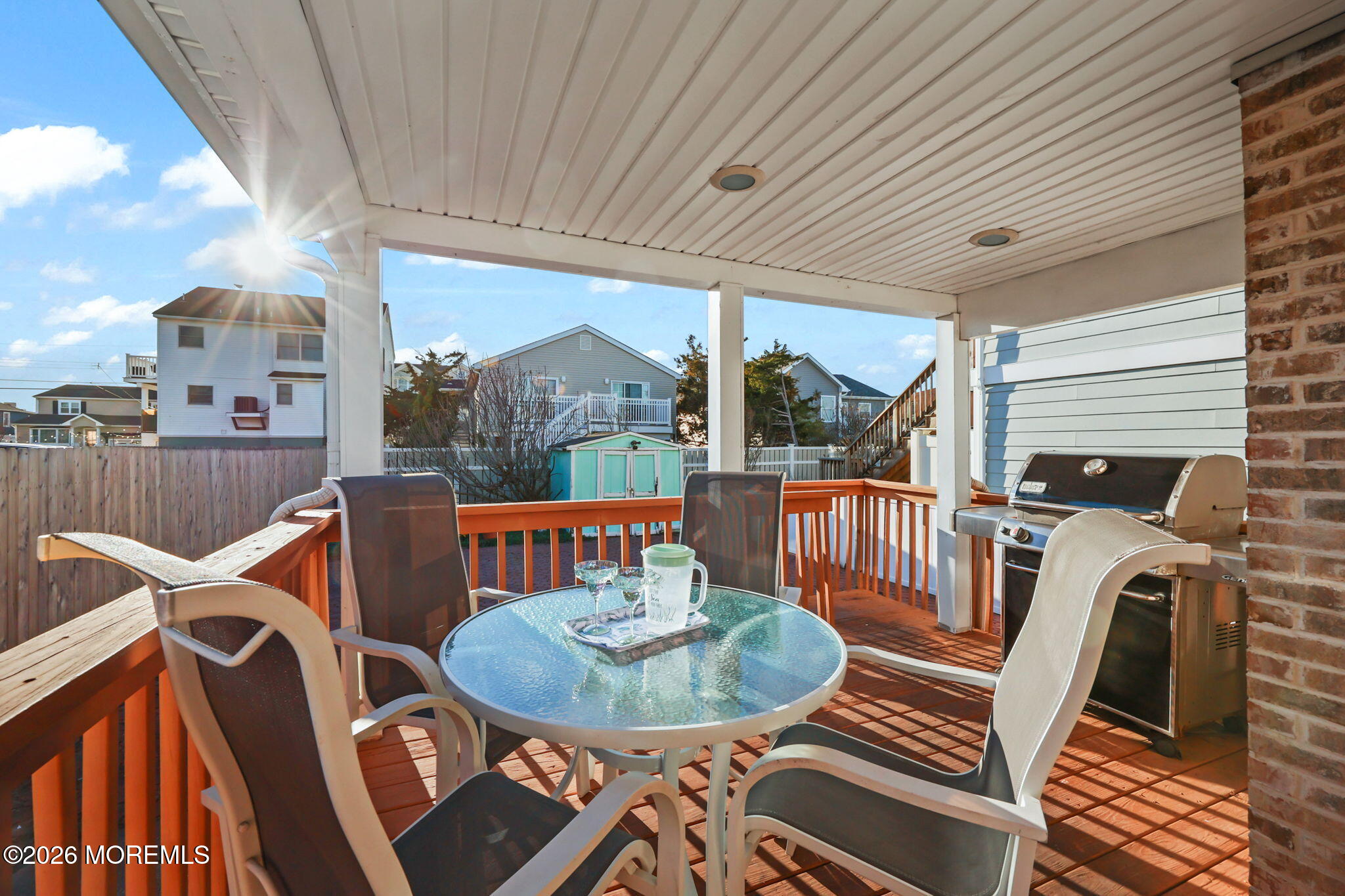 211 Ocean Avenue Point Pleasant Beach, NJ 08742 - Photo 8 of 60 a view of a chairs and table in the balcony