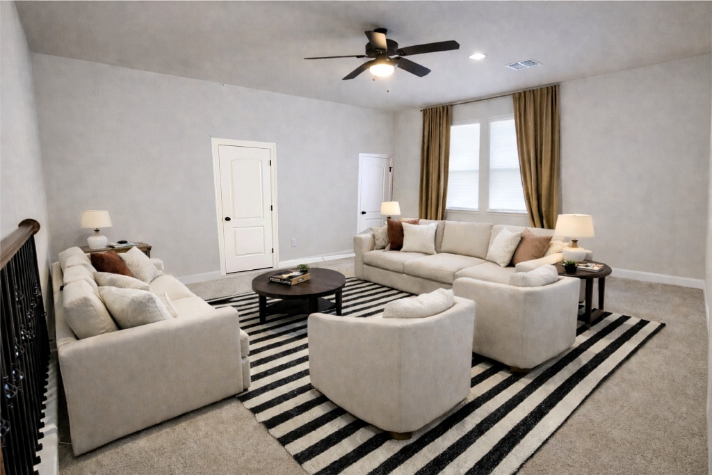 152 Silver Hawk Court Dripping Springs, TX 78620 - Photo 19 of 31 a living room with furniture and a window