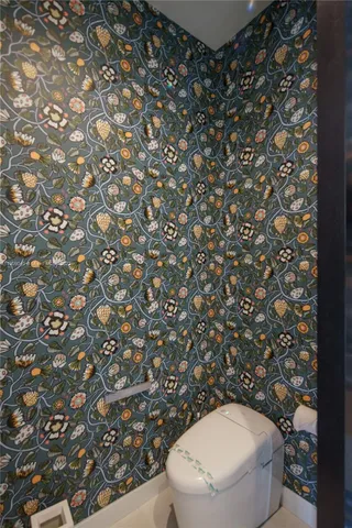 a view of a patio with a table chairs and a table