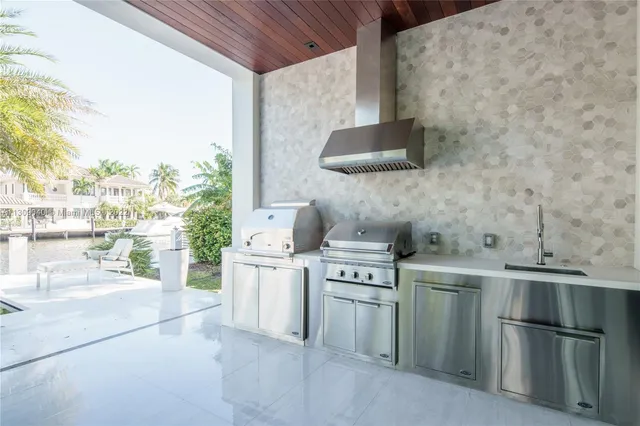a view of swimming pool with a table and chairs