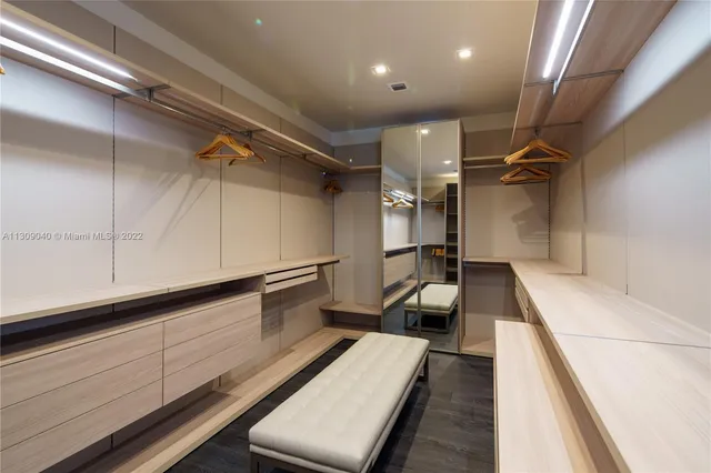 a bathroom with a shower and a toilet