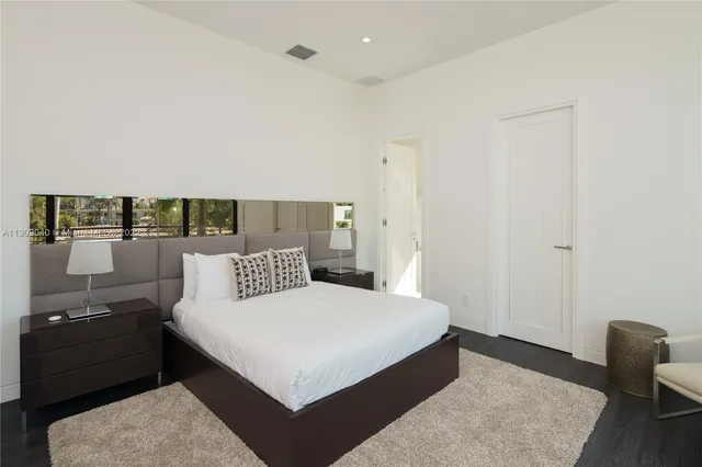 a room with furniture and flat screen tv