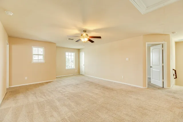 an empty room with a bathroom