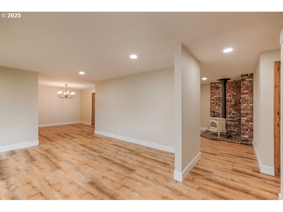 1735 Misty Place Northwest Salem, OR 97304 - Photo 9 of 31 a view of an empty room with wooden floor