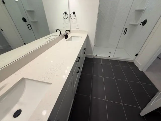 a bathroom with a sink and mirror