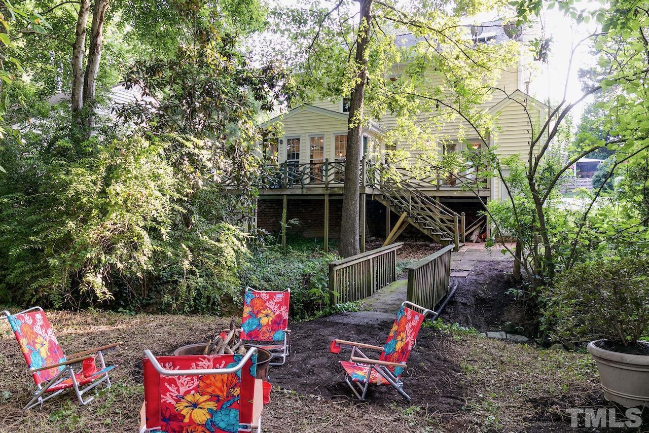 4 Cedar Hill Drive Durham, NC 27713 - Photo 16 of 49 a backyard of a house with outdoor seating