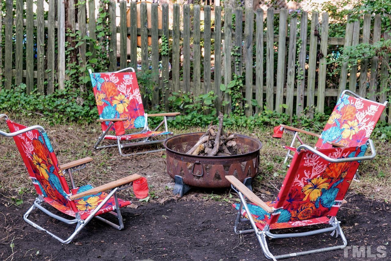 4 Cedar Hill Drive Durham, NC 27713 - Photo 17 of 49 an outdoor sitting area with couch and chairs