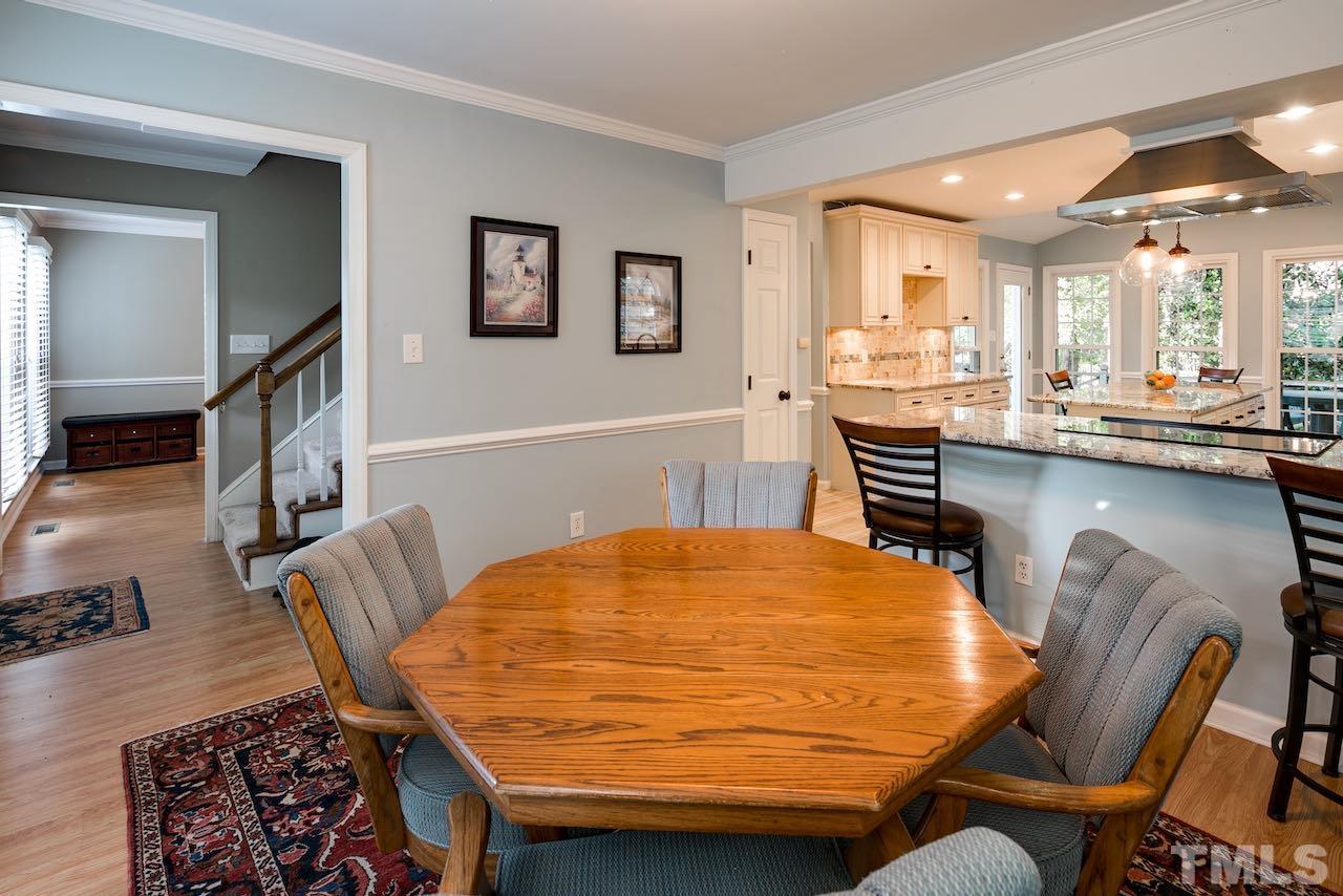 4 Cedar Hill Drive Durham, NC 27713 - Photo 7 of 49 a dining room with furniture and window